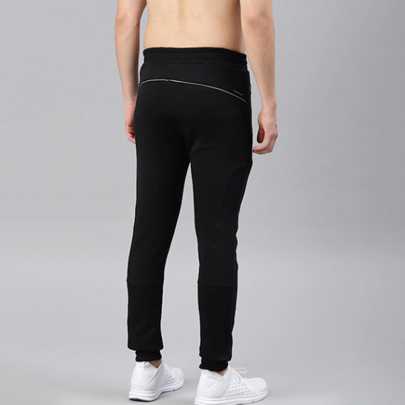 http://43.204.22.136/products/men-black-solid-rapid-dry-running-joggers