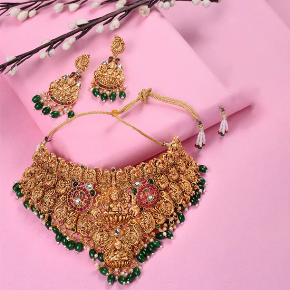 http://43.204.22.136/products/gold-plated-kemp-stone-studded-lakshmi-design-with-dangling-green-beads-choker-set